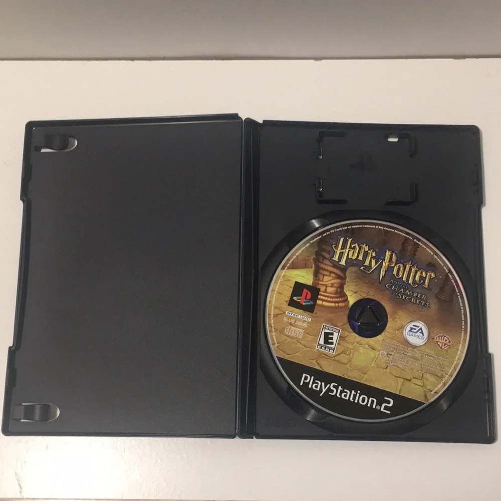 E A GAMES PLAYSTATION 2 HARRY POTTER AND THE CHAMBER OF SECRETS RATED E.